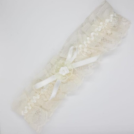 Liga novias encaje y lazo beige decorativo. 