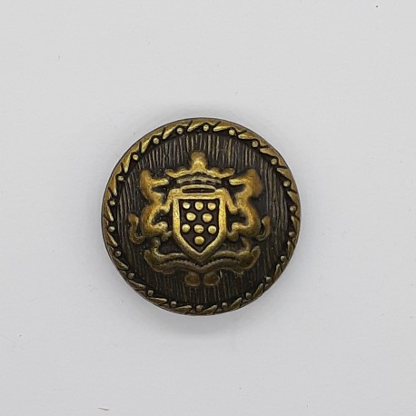 Botón metálico escudo clásico oro viejo. 