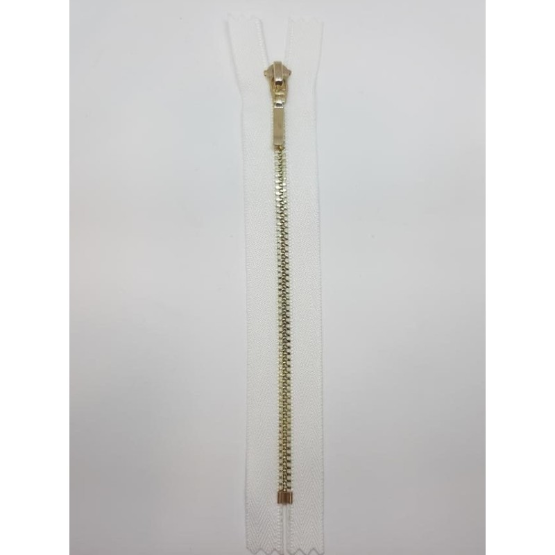 Cremallera blanca 25 cms malla oro claro visible