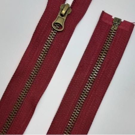 Cremallera separador metálica burdeos 60 cms diente oro viejo.