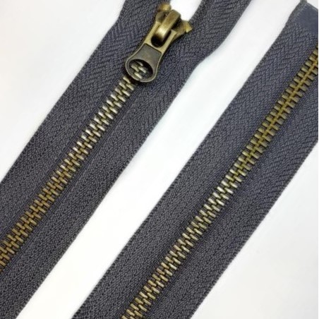 Cremallera separador metálica gris 60 cms diente oro viejo.