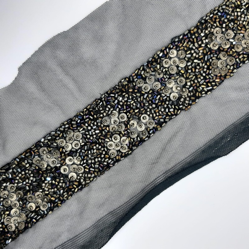 Pasamanería fantasía de cristal negro irisado. 