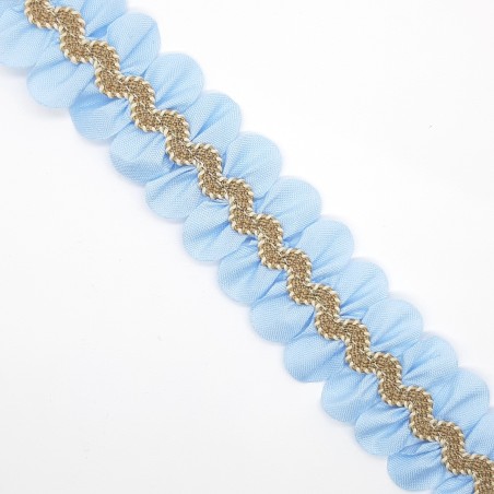 Galón pétalos de color celeste con ondulina decorativa camel. 