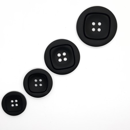 Botón negro mate de 4 agujeros. 