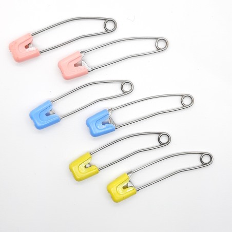 Imperdible de seguridad especial para prendas y complementos infantiles. 