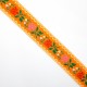 Galón tapacosturas naranja con flores de colores de 2,5 cms