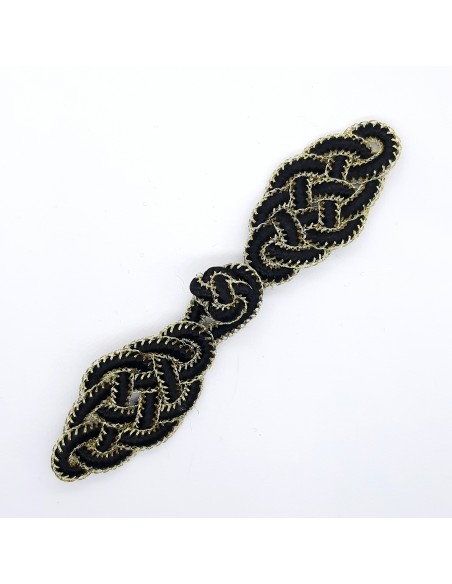 Broche pasamanería decorativo de color oro y negro