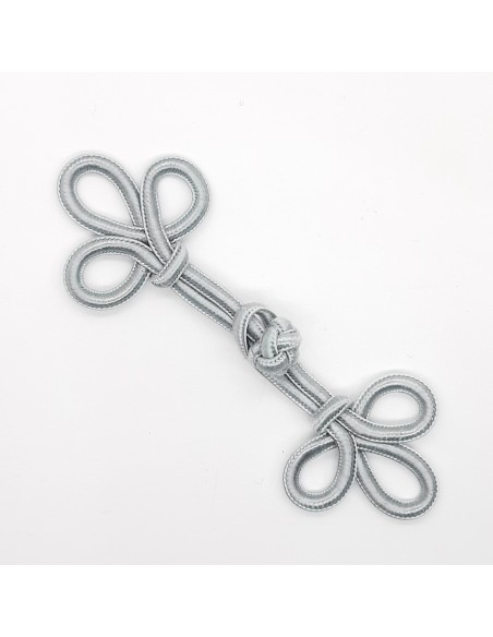 Broche cierre pasamanería gris