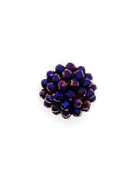 Botón piedras morado.