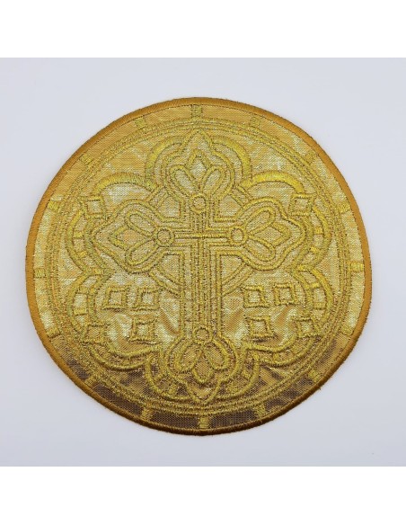 Aplicación circular con dibujo de cruz dorada