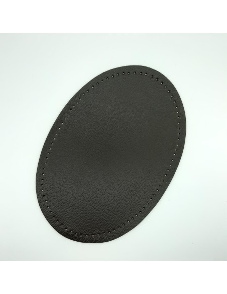 Codera polipiel negra con agujeros para coserla.