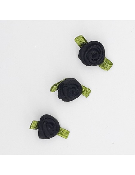 Flor de raso negro con lazo verde decorativo