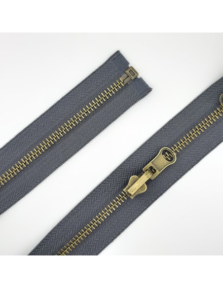 Cremallera reversible separador gris.