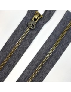 Cremallera separador metálica malla oro viejo.