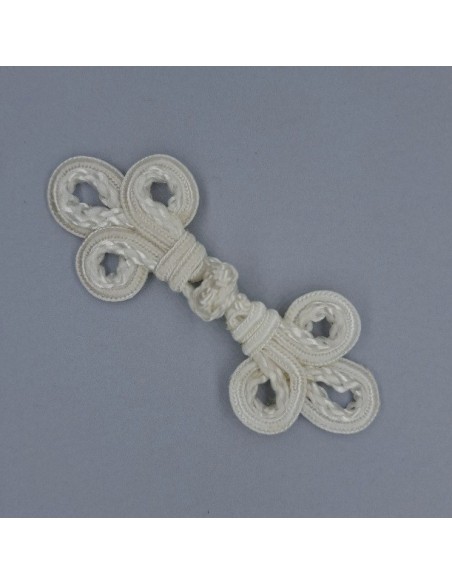 Alamar pasamanería blanco.