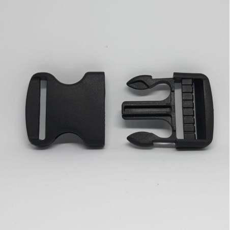 Cierre broche plástico negro mochilas.