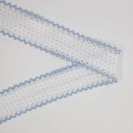 Cinta bies con lunares y puntas celeste.